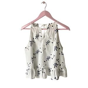 Anthropologie White Sleeveless Peplum Top with Navy Floral Print